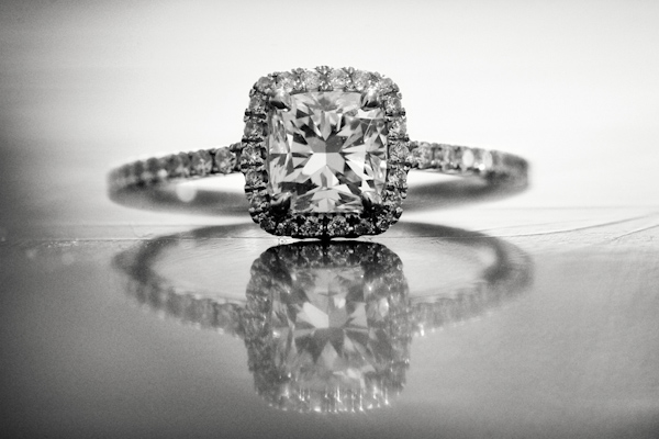Stunning diamond engagement ring with diamond halo - photo by top Atlanta-based wedding photographer Scott Hopkins Photography